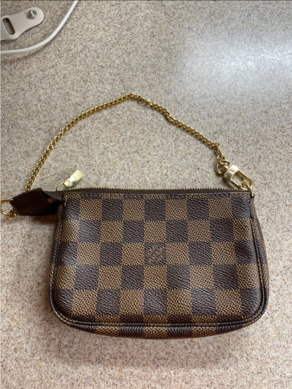 Louis Vuitton Brown Damier Ebene Mini Pochette with Gold Chain price is firm. - Picture 1 of 11